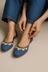 Blue embroidered khussa shoes for women with yellow floral design, traditional Pakistani footwear for weddings, Eid, and festive fashion