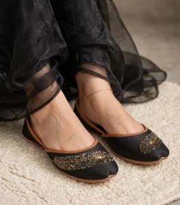 Beaded khussa for women styled with black organza outfit