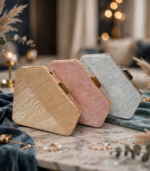 Luxury bridal clutch bags Pakistan displayed on marble table with décor