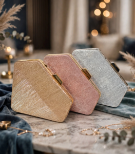Luxury bridal clutch bags Pakistan displayed on marble table with décor