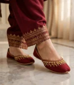 Maroon velvet khussa Pakistan worn with matching maroon outfit