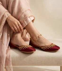 Maroon velvet khussa Pakistan styled with anklet and pastel outfit