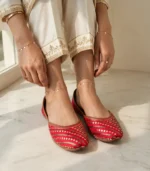 Bridal khussa for women styled with gold anklets and rings