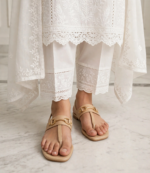 Comfortable beige T-strap sandals styled with a white embroidered lawn suit