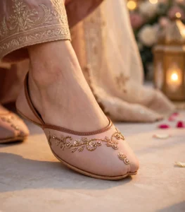 Macro shot of bridal khussa for women highlighting hand-stitched leather trim