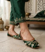 Emerald green bridal khussa styled with green silk trouser