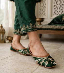 Emerald green bridal khussa styled with green silk trouser