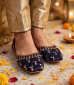 Navy embroidered khussa styled with gold trousers for Eid and mehndi