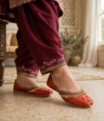 Comfortable flat khussa for women with sequin and beadwork worn with a maroon shalwar kameez