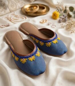 Pair of hand embroidered khussa in blue with yellow flowers and leather trim