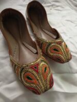 Handmade embroidered khussa shoes for women in Pakistan with gold and paisley design