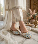 Handmade khussa shoes for women paired with a cream embroidered kurta and trouser