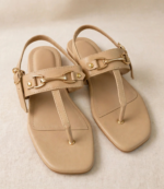 Pair of ladies beige flat sandals with gold horsebit buckle and square toe