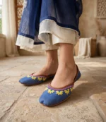Ladies denim khussa with floral embroidery styled with navy organza dupatta