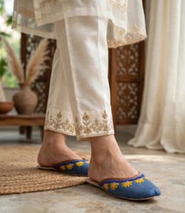 Ladies slip-on khussa in denim blue with yellow flower embroidery and beaded edge
