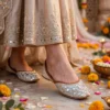 Ivory mirror work juti worn with embroidered festive outfit for wedding