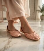Peach khussa flats women on marble floor with anklet