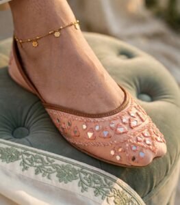 Detailed mirror embroidery on peach khussa flats women