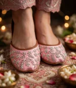 Pink bridal khussa online styled for mehndi function with diyas