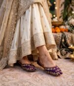 Handmade purple bridal khussa worn with ivory wedding dress and mehndi henna design