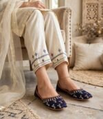 Traditional Pakistani khussa flats in navy blue with anklet, styled for casual and formal wear