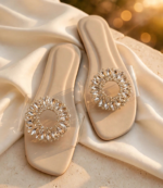 Ladies transparent strap flat slides with stone work embellishment and cushioned insole