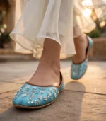Close-up of turquoise embroidered khussa in outdoor shoot