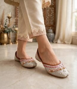 Close-up of wedding khussa online Pakistan on marble floor
