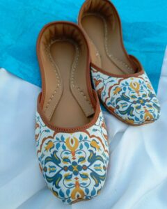 White khussa with blue and mustard floral print for women in Pakistan