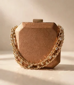 Rose gold suede party wear clutch bag with gold crystal chain strap