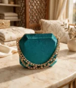 Teal velvet clutch bag with double gold chain strap and crystals